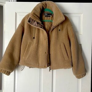 Tan, teddy faux fur bomber jacket.